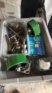 lot 5016 image: Lot of Hardware Fasteners, Light Bulbs, caster wheels  - Retail $0