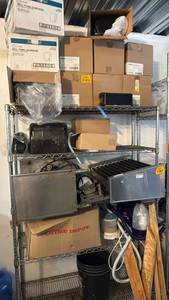 lot 5031 image: Wire Shelving Unit with Assorted Mixed Lot Contents with 9 roll towel dispensers - Retail $0
