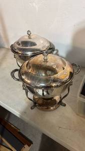 lot 5067 image: Two Silver-Plate Covered Serving Dishes with Handles and Finials - Retail $0
