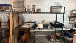 lot 5083 image: Commercial Wire Shelving Unit 2-Tier Green with everything on it  - Retail $0