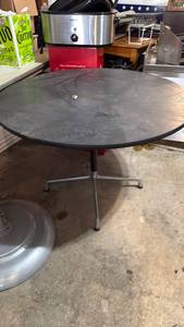 lot 5122 image: Round Dining Table with Metal Base and Black Top - Retail $0