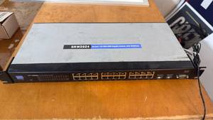 lot 5143 image: Linksys SRW2024 24-Port 101001000 Gigabit Switch with WebView - Retail $0