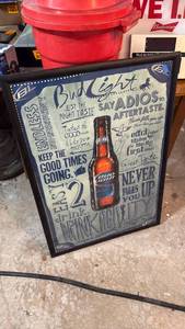 lot 5147 image: Bud Light Advertising Sign with Bottle Image and Slogans - Retail $0