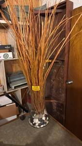 lot 5189 image: Decorative Dried Grass Stem Arrangement in Clear Glass Vase with Stones - Retail $0