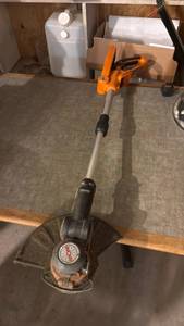 lot 5190 image: Cordless String Trimmer with Adjustable Shaft no battery  - Retail $0