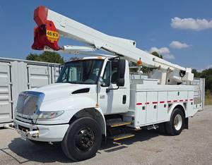lot 100 image: 2006 International MAO35 Bucket Truck 158,269 Miles - Automatic Transmission - DT 466 Diesel 7.6L - New Batteries - Upper and Lower Bucket & Winch Controls