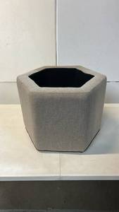 lot 8002 image: Hexagon Shaped Storage Ottoman with Vent Holes at Bottom in Gray Fabric Outside and Black Fabric Liner Inside