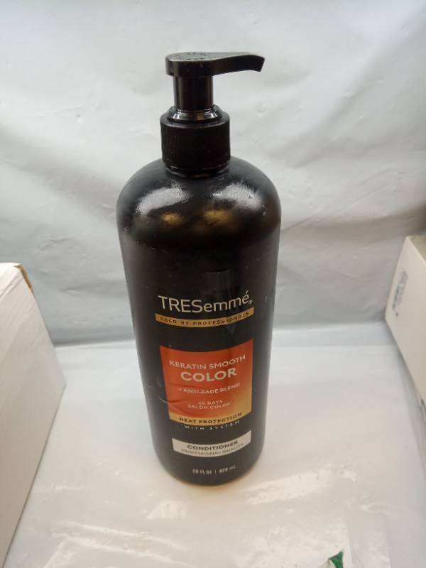 lot 129 image: Tresemme Cruelty-free Keratin Smooth Color Conditioner for Color Treated Hair - 28 fl oz Paraben-Free, Mineral Oil-Free, Contains Keratin - Retail $16