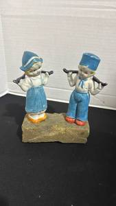 lot 1017 image: Two Child Figurines on stone Base 6 inches tall off base