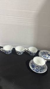 lot 1054 image: Blue Danube 4 Tea Cups with Saucers Set small chip in one saucer