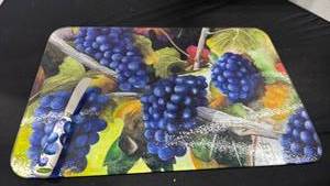 lot 1090 image: Glass cutting board and knife