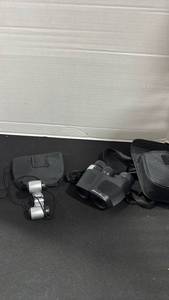 lot 1110 image: Eddie Bauer and other binoculars with cases
