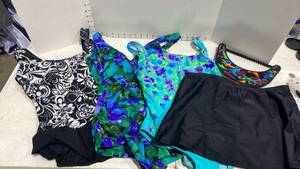 lot 1213 image: Ladies swimsuits and skirt sz 10 and 12
