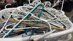 lot 1400 image: Laundry basket with hangers with garment bags and table cloth
