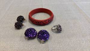 lot 1810 image: Carved bracelet and clip on earrings