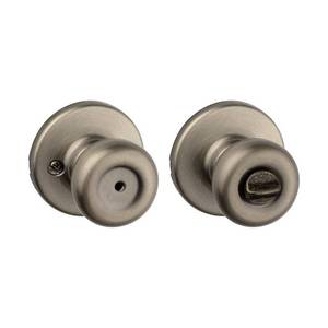 lot 61416 image: Kwikset Tylo Antique Brass Steel Privacy Knob 3 Right or Left Handed