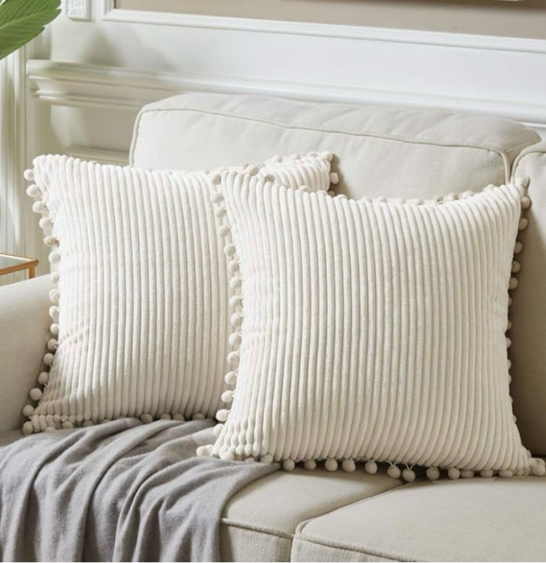 lot 5772 image: Fancy Homi Pack of 2 Boho Decorative Throw Pillow Covers with Pom-poms, Soft Corduroy Accent Solid Square Cushion Case Set for Couch Sofa Bedroom Car Living Room (20x20 Inch50x50 cm, Cream)