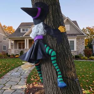 lot 9160 image: DANGIFTUS 63 Crashing Witch Halloween Decoration, Witch Flying into Tree - Retail $24
