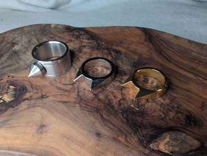 lot 1213 image: 3 Spike Rings Silver Black Gold Tone