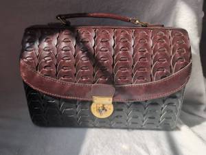 lot 1407 image: Quilted Leather Handbag with Top Handle and Turn Lock Closure