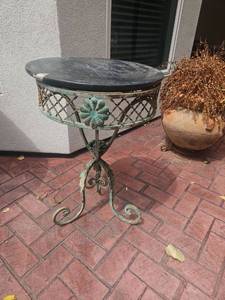 lot 70 image: Pedestal Side Table Round Black Top Ornamental Metal Base