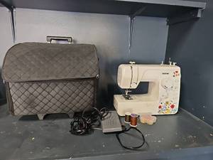 lot 3173 image: Brother JX2517 Sewing Machine with Carrying Case and Accessories