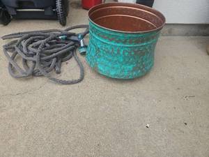lot 3209 image: Garden Hose- Spray Nozzle With Decorative Metal  Storage Container
