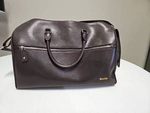 lot 10094 image: Brucky Black Handbag with Shoulder Strap and Dual Handles  Appears New or Very Lightly Used