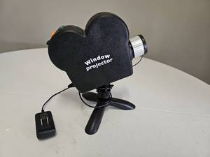 lot 10138 image: As Seen on TV Window Wonderland, ChristmasHalloween Decoration Light Projector