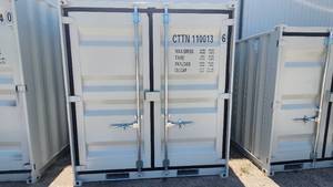 lot 7227 image: Captok 11FT Storage Container  Model CTTN-T11  CTTN1100136  11ft L X 7ft 4in H x 6.5ft W