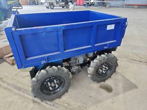lot 601 image: Blue Dump Cart with Electric Motor and Remote Control No Charger