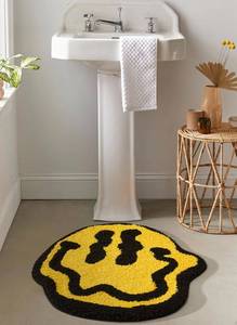 lot 3906 image: Estmy Trippy Happy Face 2ft Round Bath Rug - YellowBlack Rubber Backed