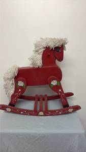 lot 303 image: Red Rocking Horse with Cream Yarn Mane and Tail