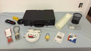 lot 315 image: Gun case, misc cables, lock with key, gun locks, misc storage trays, coax adapters and toilet seat bolts