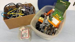 lot 324 image: Misc electronic cords, gun cleaning items