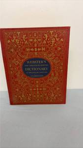 lot 329 image: 1965 Webster dictionary