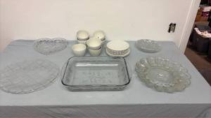 lot 339 image: Cake pan, heart dish, egg platter, crystal dish, ironstone dishes and clear platter.