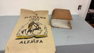 lot 362 image: Alfalfa bag and old book