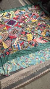 lot 420 image: Vintage Quilt Top with Newspaper backing approximately 65x68