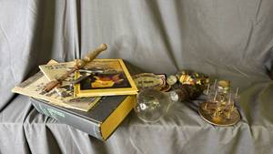 lot 484 image: Vintage Books, Spark Plugs, Patches and more