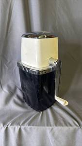 lot 485 image: Swing-A-Way Vintage Ice Crusher Hand Crank Black White Chrome - see picture for crack in plastic bottom part