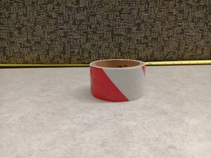 lot 1031 image: Red and White Reflective Safety Tape Roll