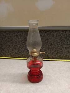 lot 1034 image: Clear Glass Vase with Red Oil