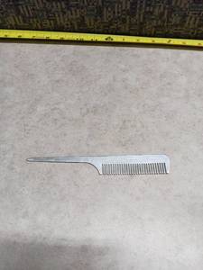 lot 1064 image: Steel Tail Comb Hand Made in Japan