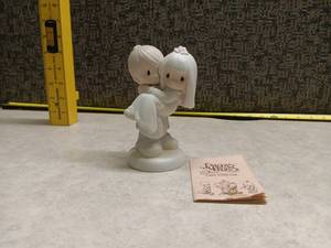 lot 1108 image: Precious Moments Figurine - Bless You Two