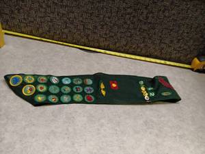lot 1126 image: Girl Scout Sash with Merit Badges and Patches