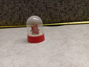 lot 1162 image: Silvester Handcrafted Snow Globe Red Base