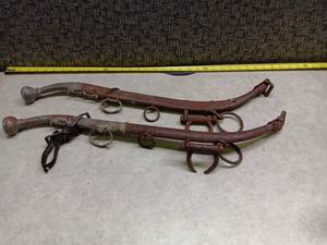 lot 1165 image: Vintage Cast Iron Curved Spur Spurs Pair w Leather Straps