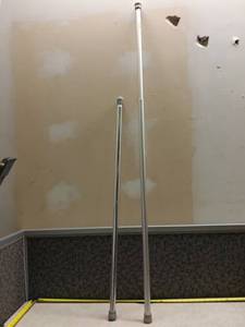 lot 1193 image: Pair of Shower Curtain Rods w Extending Mechanisms