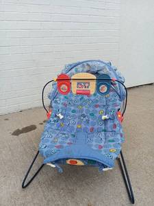 lot 1202 image: Fisher-Price Infant Bouncer with Toy Bar - Blue